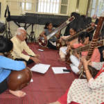 Shri Prabhakar Kulkarni Giving sitar Lessons